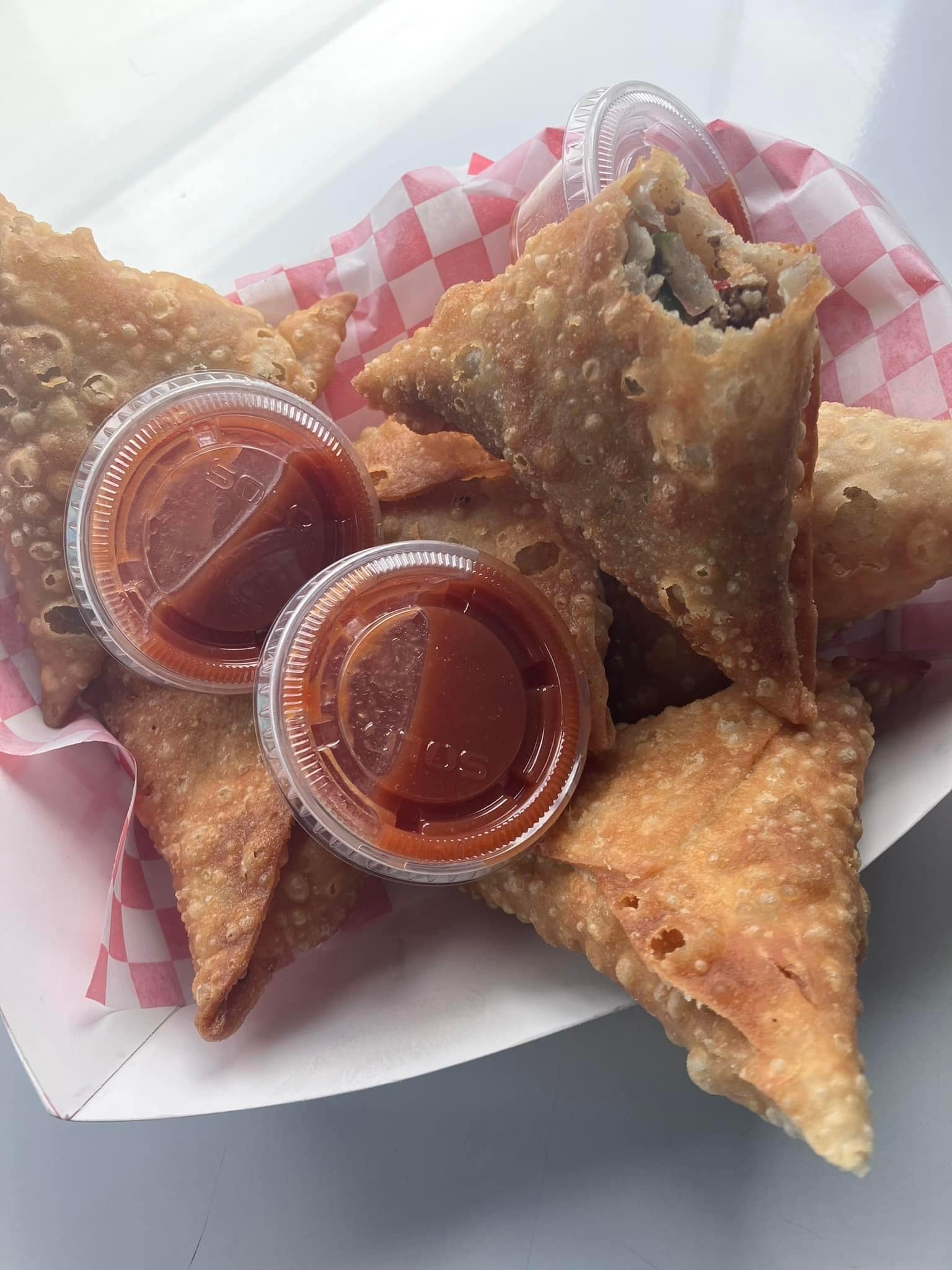 Fresh sambusas served hot
